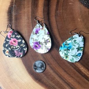 Three pairs of leather floral dangle earrings